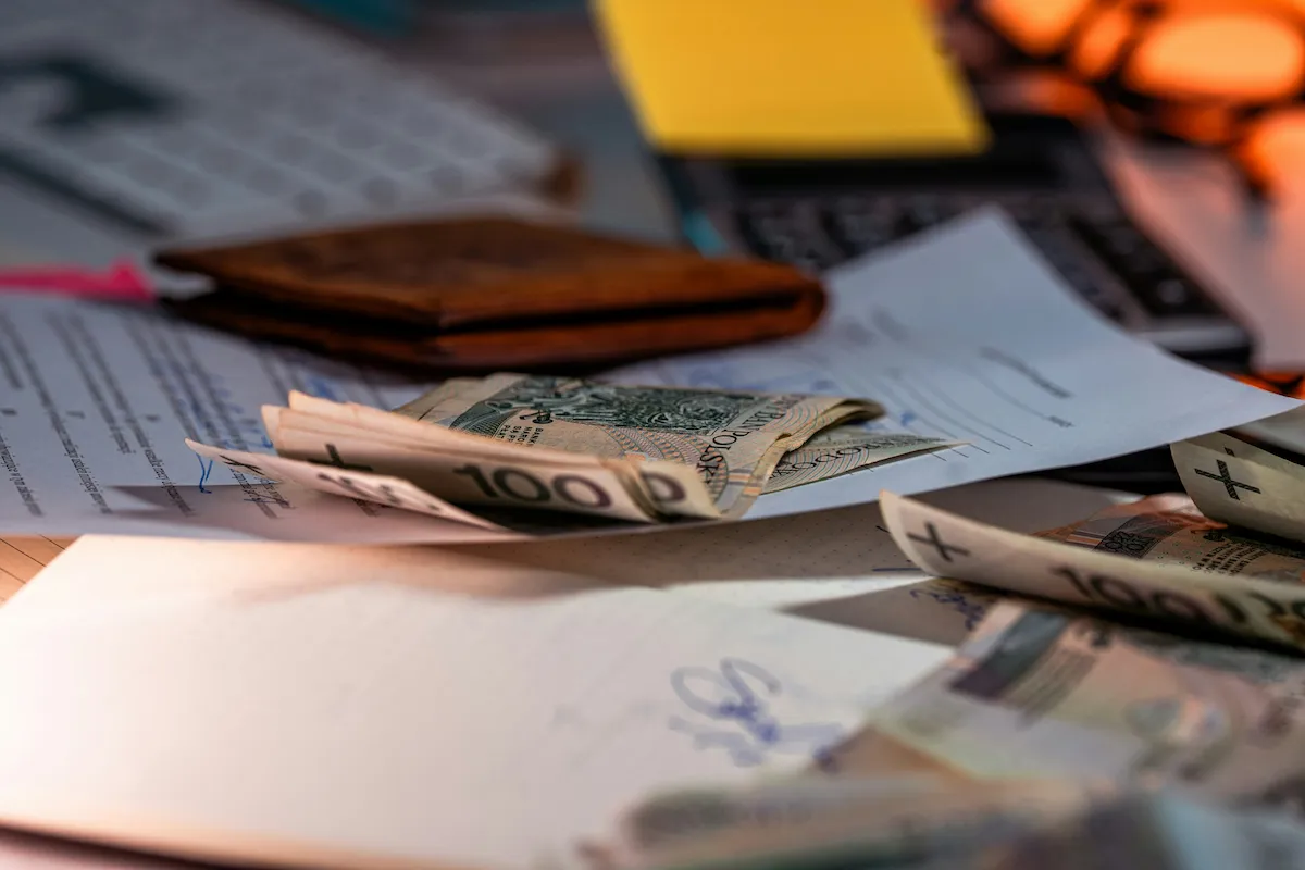 Money bills representing hidden moving costs